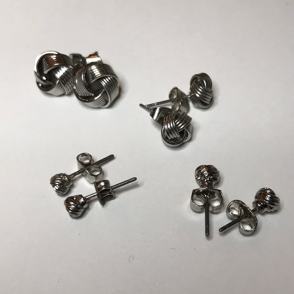 4 sets of silver knot earrings